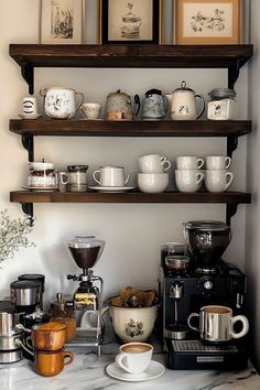 the shelves are filled with coffee cups and other kitchen items, including two espresso machines