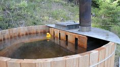 a rubber duck floating in an outdoor hot tub