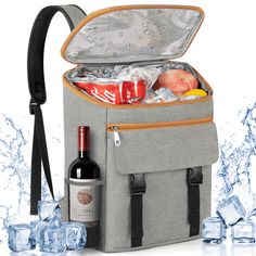 the cooler bag is filled with drinks and ices