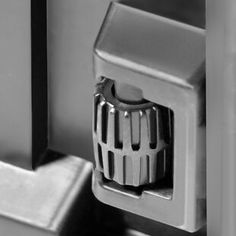 a close up view of the inside of a refrigerator door with a hole in it