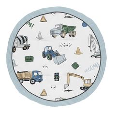 a round play mat with construction vehicles and trucks on it, in blue and white