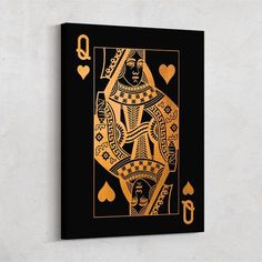 the queen of spades playing card in gold on a black background canvas print wall art