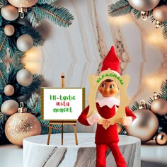 an elf is standing in front of a sign