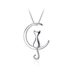 Embrace the mystical allure of the moon with our .925 Sterling Silver Cat on Moon Necklace! Designed for both lunar enthusiasts and feline lovers, this delightful piece merges celestial charm with graceful cat motifs. Let your unique style sparkle with this enchanting accessory! 16” Chain with 2” extension 1” Pendant Material: .925 Sterling Silver FREE SHIPPING on all orders Cat On Moon, Silver Cat Design Round Necklace, Elegant Silver Necklace With Cat Design, Affordable Silver Charm Necklace With Cat Design, Sterling Silver Moon-shaped Charms Necklaces, Elegant Cat Design Pendant Necklace, Silver Cat Design Necklace, Cat Necklace Silver, Cat Motif