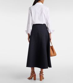 Tweed midi skirt in blue - Valentino | Mytheresa Chic Flowy Wool Skirt, Chic Wool Flared Skirt, Office Wool Flared Skirt, Wool Midi Skirt For Workwear, Long Wool Skirt For Workwear, Wool Long Skirt For Workwear, Elegant Wool Full Skirt, Spring Skirt With Concealed Front Fastening, Elegant Wool Midi Skirt