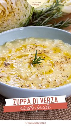 a bowl of soup with herbs in it and the words zupa di vezza