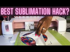 a person is using a machine to make a piece of paper with the words best sublimation hack?