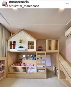 there is a bunk bed in the middle of this room with stairs to the second floor