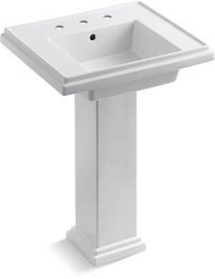 a white pedestal sink on a white background