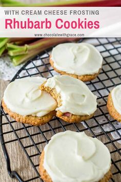 several cookies with cream cheese frosting on a cooling rack