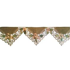 an image of a decorative window valance with flowers on the side and leaves on the top