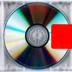 an empty cd case with a red disk in it