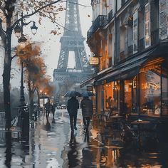 the eiffel tower is lit up in the rain as people walk down the street