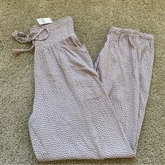 Aerie Real Good Smocked High Waisted Beach Pants -Beach Pants -Size Xs -Aerie Joggers -Color: " Cocoa Cream" - Light Tannish Pinky/Dusty Tannish Rose Color- Nice Neutral Color With White/Cream & Darker Polka Dot Design -High Waisted With Smocked Elastic Waist And Drawstring -Large Pockets On Both Sides Of Thighs -Elastic Jogger Ankle -Loose Fitting Pant In Lightweight Gauzy Material New With Tags Aerie Real Good Smocked High Waisted Beach Or Every Day Pants Aerie Joggers, Loose Fitting Pants, Aerie Real, Beach Pants, Polka Dot Design, Dot Design, Neutral Color, Rose Color, White Cream