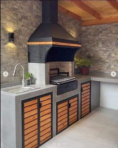 an outdoor kitchen with a stove and sink