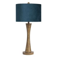 a wooden table lamp with a blue shade