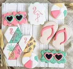 some decorated cookies are sitting on a table