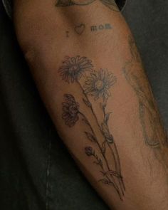 tattoo idea | tattoo inspiration #tattoo #tattoosforwomen #tattooideasformen #tattooinspiration Bundle Of Sunflowers Tattoo, X Inspired Tattoos, Bird Arm Tattoo Men, Sunflower Bundle Tattoo, Men Tattoo Stomach, Masculine Daisy Tattoo, Guy Flower Tattoo, Words On Collar Bone Tattoo, Masculine Patchwork Tattoo