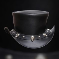 Leather Top Hat EI Dorado Steampunk Top Hat - Steampunk Gothic Victorian Style -  Handmade Skull Band  Leather Top Hat - Biker Hat *Condition: New  *Made with Geniune Leather *All Sizes Available *Totally handmade item *Skull Band Return Policy: We take pride & joy in our products and above all customer satisfaction is very important to us. Due to this we aim to respond to any customer queries and questions within 24 hours. If you have any queries about size, get in touch with us.  If for any re Leather Top Hat, Steampunk Top, Steampunk Top Hat, Handmade Skulls, Steampunk Accessories, Gothic Victorian, Victorian Gothic, Victorian Style, Top Hat