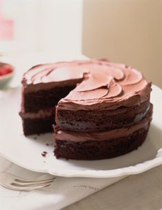 a chocolate cake with one slice cut out