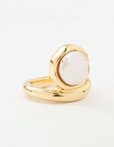 Elevate your ring game with this show-stopping oversized pearl ring! With a gold-toned base and an organic vibe, the chic pearl accent adds just the right amount of drama and elegance. It's basically a red carpet moment for your finger. Dimensions: Diameter 18.5 mm x Band Width 3 mm Feature Dimensions: Feature Width 13 mm x Feature Length 10 mm | Lovisa Gold Organic Pearl Band Ring, Size: Small/Medium Ring Game, Pearl Ring, The Chic, Band Ring, Fashion Rings, Band Rings, Red Carpet, Gold Tones, Ring Size