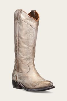 The Billy Daisy Pull-On Boot personifies craftsmanship with a modern Western silhouette, pointed toe, and pull tabs. The chunky block heel adds a touch of edge, while the Goodyear welted construction ensures superior durability and comfort. Available in a range of versatile hues, these boots seamlessly pair with everything from fitted denim to flowy midi dresses. Idk What To Wear, Western Silhouette, Tall Western Boot, Womens Tall Boots, The Frye Company, Patent Leather Boots, Modern Western, Western Boots Women, Frye Boots