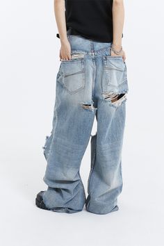 Embrace your unique style with our Distressed Ripped Knee Wide-Leg Denim Jeans, the epitome of laid-back chic.
Expertly crafted from soft, high-quality denim, these jeans feature a relaxed wide-leg fit and artfully placed distressed knee rip details for an authentically worn look. The washed denim blue hue and thoughtful distressing convey an air of effortless sophistication, while providing comfort and durability for your everyday adventures.
Mix and match with your favorite tees or dress them Distressed Denim Flare Jeans With Cutoff, Distressed Cutoff Flare Jeans, Distressed Denim Cutoff Flare Jeans, Urban Ripped Denim Jeans, Urban Style Ripped Denim Jeans, Urban Style Ripped Jeans, Ripped Medium Wash Rigid Denim Jeans, Ripped Jeans In Medium Wash Rigid Denim, Ripped Dark Wash Rigid Denim Jeans