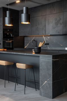 a modern kitchen with marble counter tops and stools next to an island in the middle