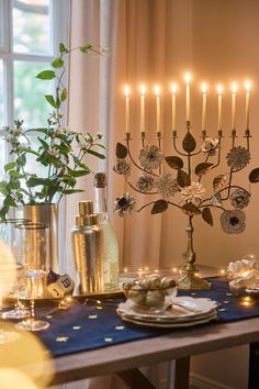 Gold chargers, crystal glassware, and fine white china with gold accents. Hanukkah Lights Outdoor, Hanukkah And Christmas Decorations, Jewish Christmas Decorations, Hannakuh Decor, Chanukah Food, Velvet Runner, Hanukkah Desserts