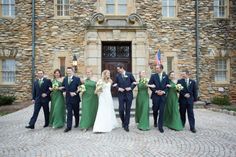 a group of people standing in front of a building