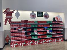 the christmas decorations are on display in the store's aisles and around the shelves