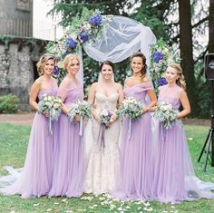 a group of women standing next to each other