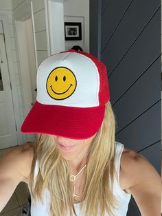 Adorable and so much fun!! This Smiley Face Vintage Trucker hat sits high for that cool Cali surfer vibe. Fully adjustable, foam backing with cotton front, trucker style with a mesh back. Perfect for the beach, sun, or just a bad hair day. Get ready for Summer!! Adjustable Baseball Cap With Smiley Face, Casual Smiley Face Snapback Hat, Adjustable Smiley Face Cap, Trendy Smiley Face Cap, Fun Red Trucker Hat, Trendy Smiley Face Hat With Curved Brim, Trendy Curved Brim Hat With Smiley Face, Trendy Smiley Face Baseball Cap, Fun Red Adjustable Trucker Hat