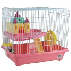 a pink and white bird cage filled with toys