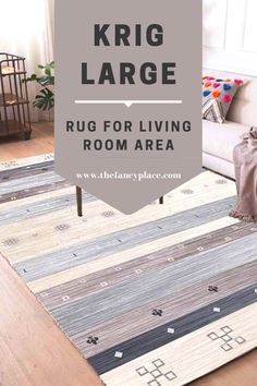 the rug for living room area is in grey and white