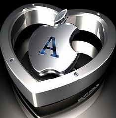 an apple logo is shown in the middle of a heart shaped object with letters on it