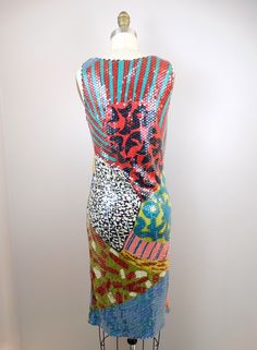 "This is such a rare dress from Missoni. It's fully embellished with clear sequins on silk with a funky abstract design. It's in excellent condition! Measurements: (note, there's a little stretch in the material) Bust - 32-36\" Waist - 30-34\" Hips - 36-40\" Total Length - 39\" This dress comes from a pet-free and smoke-free home. If you would like more info or have any questions, please don't hesitate to ask!" Multicolor Contrast Sequin Dress, Multicolor Long Party Dress, Red Silk Dress With Sequins, Red Silk Sequined Dress, Multicolor Sequined Maxi Dress For Party, Multicolor Maxi Dress For Cocktail Party, Multicolor Maxi Dress For Cocktail Party Season, Red Contrast Sequin Summer Dress, Spring Multicolor Sequined Maxi Dress