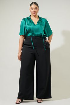 Step into any room and leave a lasting impression in the Angela Satin Tie Neck Flutter Sleeve Blouse! Its cute look with a ruffle trim, split neck can be secured by a tie string detail. Flowy short sleeves offers a more modest look, along with a relaxed bodice. Wear it tucked or as is into your favorite high waisted bottoms and pair it with mules.- Flouncy sleeves- Split neckline- Ruffle trim- Relaxed fit- Comes in 4 colorsSize + Fit - Model is 5'9" and wearing size 2X- Measurements taken from s Gig Outfits, Flouncy Sleeves, Gig Outfit, Flutter Sleeve Blouse, Flowy Shorts, Tie Neck, Sweater Weather, Ruffle Trim, Flutter Sleeve