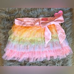 Nwt This Kawaii Lace, Layered, Rainbow Miniskirt With An Adorable Pink Bow Is Perfect For A Nice Tea Party Or A Nice Walk In The Garden With A Loved One Or A Friend. This Piece Is In The Size L And Is Only Slightly Stretchy At The Top. Has A Zipper And A Clasp Black Pleated Mini Skirt, Rainbow Skirt, Lace Mini Skirt, Velvet Mini Skirt, Sugar Thrillz, Neon Aesthetic, Sewing Diy, Halloween Outfit, Pink Tulle