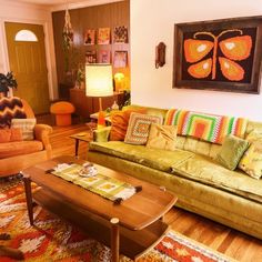 a living room filled with furniture and decor