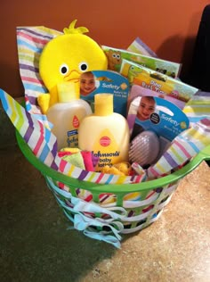 a basket filled with baby items on top of a counter