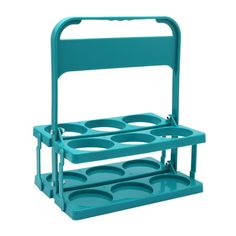 a teal plastic rack with four trays on it