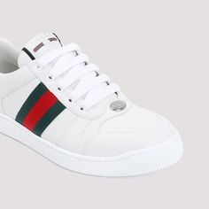 These kicks are the epitome of laid-back luxury, blending classic Italian craftsmanship with a playful pop of color. They're the kind of sneakers you can dress up or down without missing a beat. Trust us, your feet will thank you. Premium white leather with iconic green and red web Embossed GG leather insert for that signature touch Enameled oval metal detail with Double G Gucci logo on the tongue and back Durable rubber sole Made in Italy Season: FW24 100% Leather composition | Gucci Women's Sc Gucci Elegant, Red Web, White Leather Sneakers, Buy Gucci, Leather Cap, Logo Pattern, Mens Gloves, Green And Red, Sneaker Heels