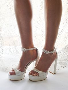 So modern and comfort platforms made to go dancing in all night. Crafted in Greece from soft pearl white leather embellished with pearls, they're set on block 120mm block heels with stabilizing platform soles. Wear them on your wedding day and make your legs look even longer. ♥ Colour: Ivory ♥ Heel height: 12 cm (4.72 in) ♥ Platfom height: 3 cm (1.18 in) ♥ Sizing: Fits true to size, take your normal size ♥ If you need a rush delivery please let us know. ♥ Returns: The item(s) can be returned for Bride Platform Shoes, White Wedding Platform Heels, Bridal Shoes Block Heel Platform, Elegant Platform Heels, Bride Platform Heels, White Wedding Shoes Brides Heels Elegant, Block Heel Wedding Shoes Brides Elegant, Block Heel Wedding Shoes Brides Comfortable, Wedding Platform Shoes