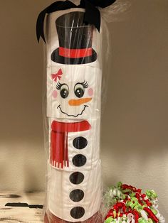 a snowman made out of plastic wrapped in cellophane