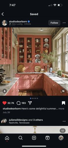 an instagram image of a kitchen with pink cabinets