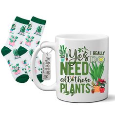 two coffee mugs with plants on them and one has the words yes i really need to