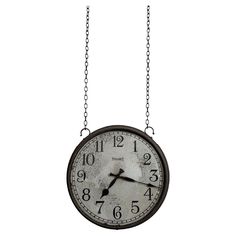 an old clock hanging from a chain on a white background with the time is 11 00