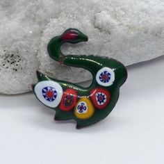 A great gift for mom, wife or girlfriend. Rare vintage brooch in the form of a bird.Very delicate work.Green- blue enamel . Size 2 cm x 2 cm          0.6 in x 0.6 in I'm always happy to combine multiple items to save on shipping,just ask! International Buyers Attention! Please be aware that there may be VAT, import or customs fees in your country. These fees are your responsibility and I may not be aware of the fees for each country. Please contact your local postal service for more information. Artistic Enamel Brooch Pin For Gift, Retro Enamel Pin As Gift, Unique Green Enamel Pin, Green Brooch Enamel Pin For Gift, Green Enamel Brooch Pin As Gift, Green Enamel Pin Brooch For Gift, Blue Enamel Brooch Gift, Blue Enamel Brooch For Gift, Blue Enamel Brooches For Gift