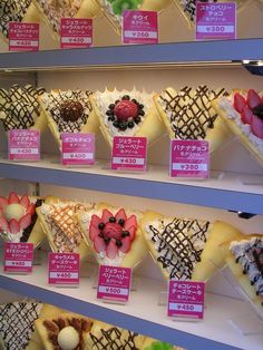 there are many different types of desserts on display